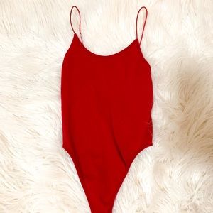 red bodysuit